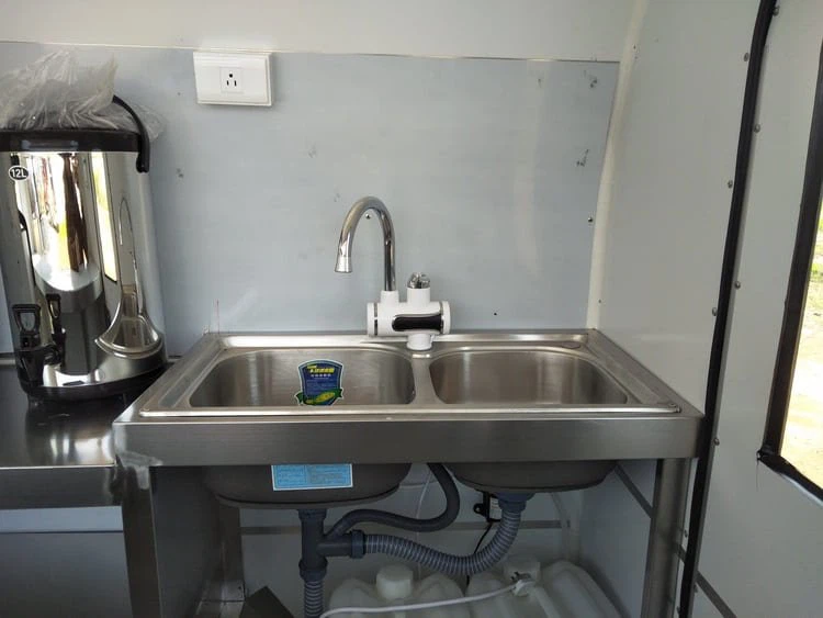 2 compartment water sinks in the soft serve ice cream concession trailer