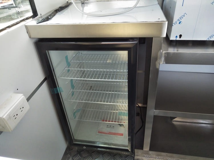 vertical freezer in the soft serve ice cream concession trailer